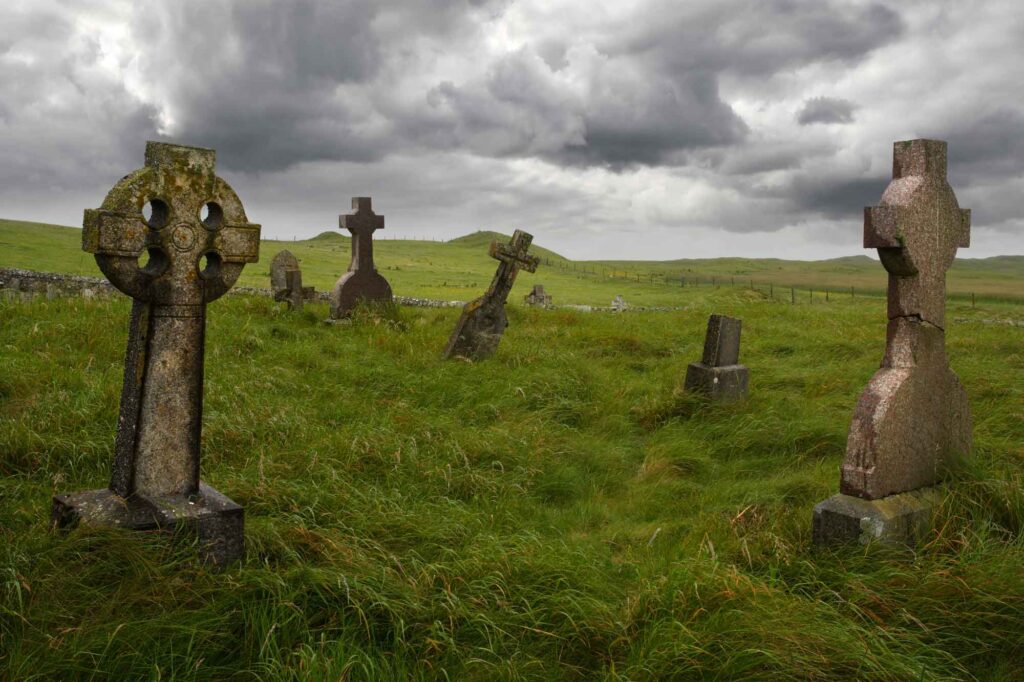 Celtic Crosses at a Cemetery. The ancient Celts derived inspiration from nature and carried out ritual and worship in the woods. Later, many of their progeny would convert to Christianity.